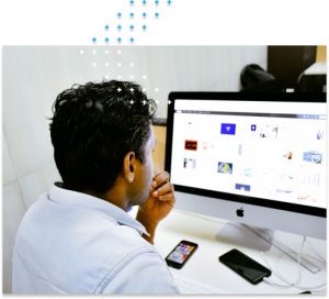 Man-looking-at-data-on-the-computer Man looking at data on a computer